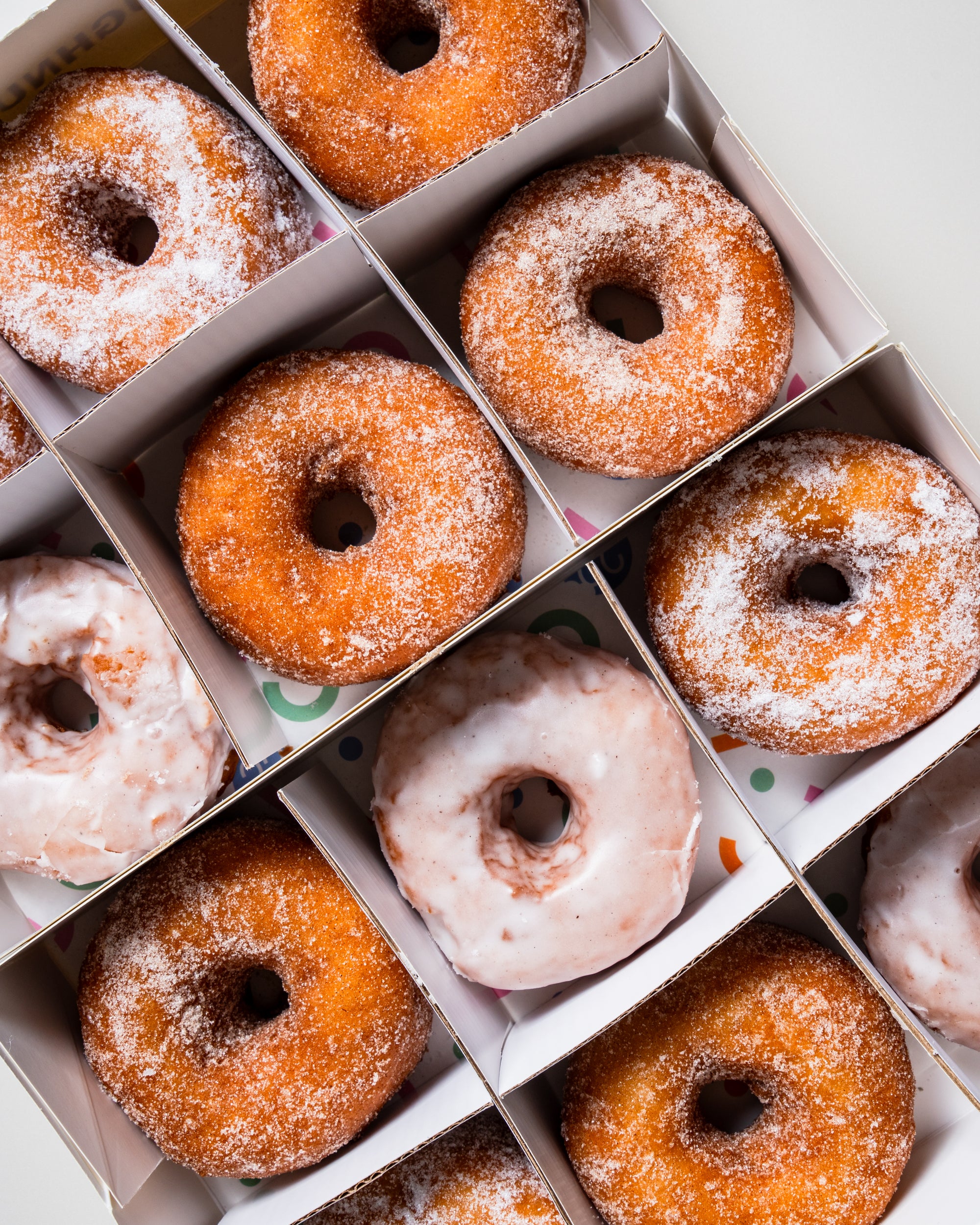 Corporate box of 24 gluten-free, vegan ring doughnuts