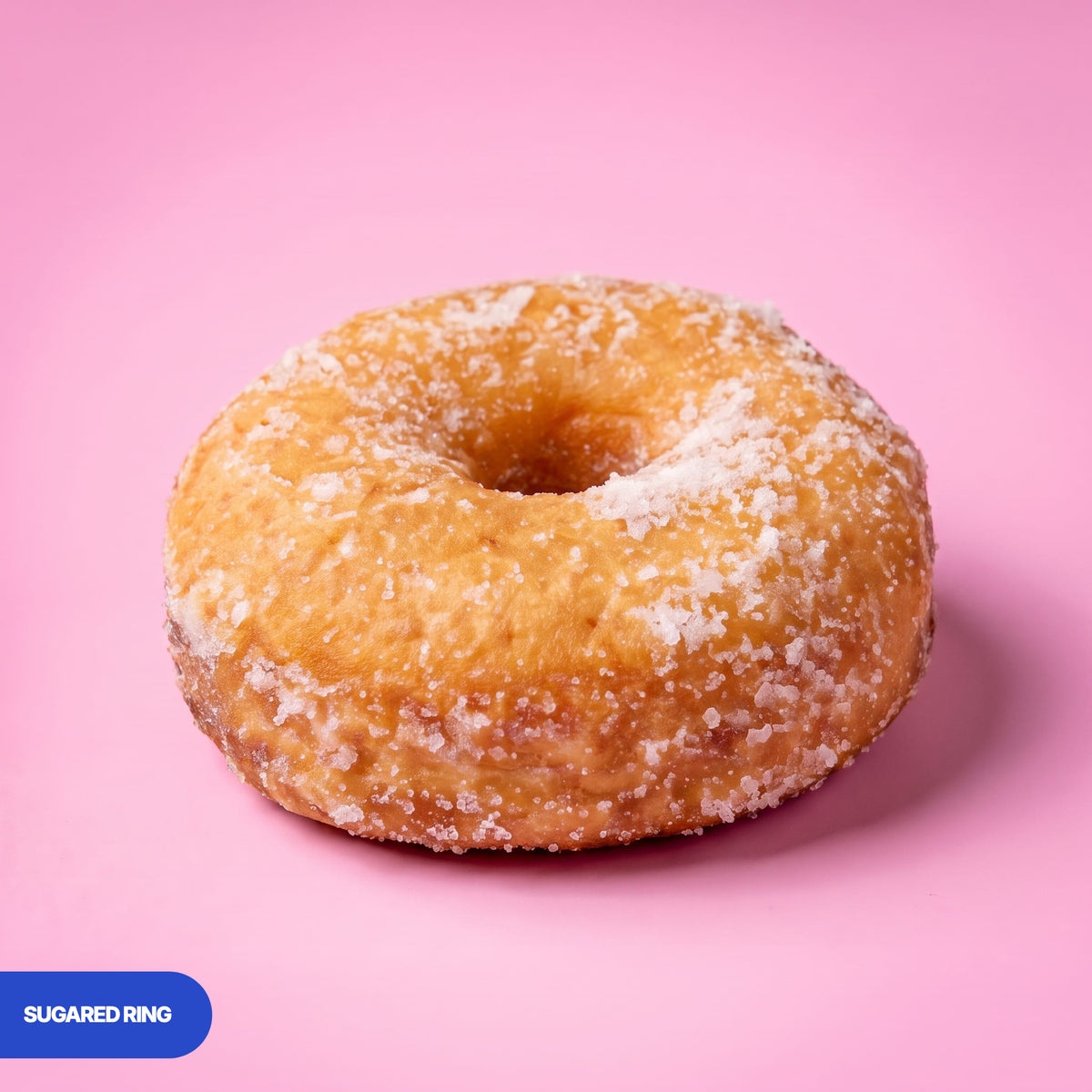 Gluten free vegan fried ring doughnut rolled in caster sugar