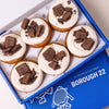 Open Borough 22 box of six gluten free vegan fried cookies and cream doughnuts, topped with vanilla cream and chocolate biscuit pieces